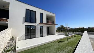 Thumbnail von Newly built semi-detached house with sea view, garden, and two parking spaces.