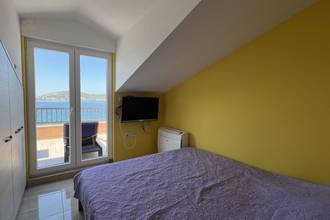 Thumbnail von House in the first row to the sea with three apartments and a studio