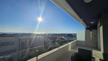 Modern and furnished apartment with sea view