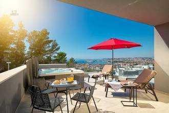 Modern villa with heated pool, wellness area, and sea view