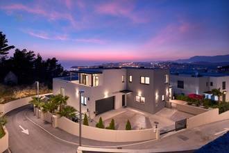 Modern villa with indoor pool, wellness area, and sea view
