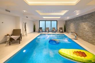 Thumbnail von Modern villa with indoor pool, wellness area, and sea view