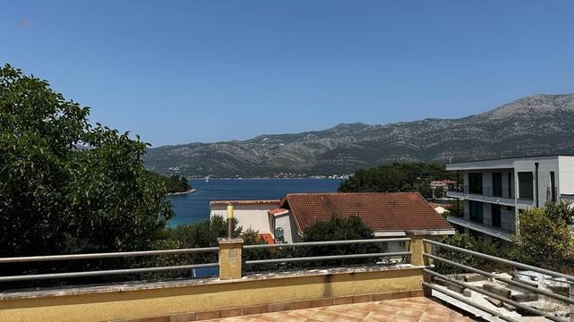 Erdgeschosswohnung mit Terrasse und Meerblick nahe dem Strand