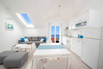 Thumbnail von Modernly renovated apartment building with four units and sea view