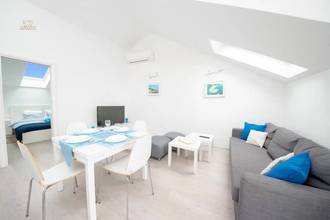 Thumbnail von Modernly renovated apartment building with four units and sea view