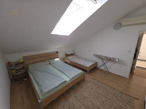 Thumbnail von Bright attic apartment with sea view and private parking space