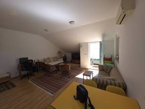Thumbnail von Bright attic apartment with sea view and private parking space