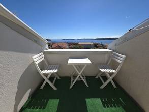 Thumbnail von Bright attic apartment with sea view and private parking space