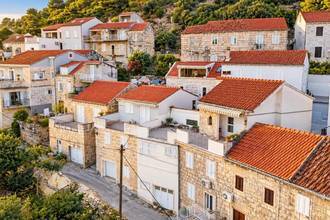 Thumbnail von Renovated stone house with large roof terrace and sea view