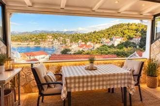 Thumbnail von Renovated stone house with large roof terrace and sea view
