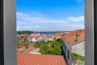 Thumbnail von House with three residential units, garden, and sea view, near the sea