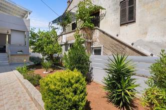 Thumbnail von House with three residential units, garden, and sea view, near the sea