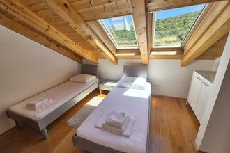 Thumbnail von White-clad natural stone house with infinity pool and 3 spacious units