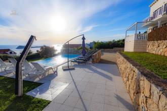 Thumbnail von White-clad natural stone house with infinity pool and 3 spacious units