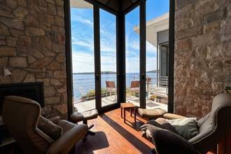 Thumbnail von Well-maintained stone house directly on the water, two units, saltwater pool