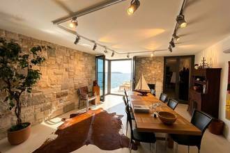 Thumbnail von Well-maintained stone house directly on the water, two units, saltwater pool