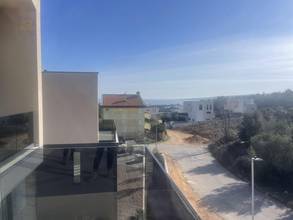 Thumbnail von Small new development consisting of two houses, apartments with water views