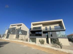 Thumbnail von Small new development consisting of two houses, apartments with water views