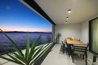 Thumbnail von Two-story penthouse directly on the water, rooftop terrace with infinity pool