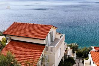 Thumbnail von Well-maintained holiday property with guest studios and a konoba, ten meters to the shore.