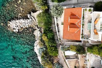 Thumbnail von Well-maintained holiday property with guest studios and a konoba, ten meters to the shore.