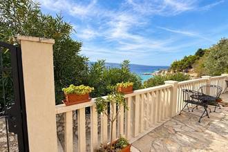 Thumbnail von Well-maintained holiday property with guest studios and a konoba, ten meters to the shore.