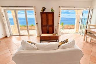 Thumbnail von Well-maintained holiday property with guest studios and a konoba, ten meters to the shore.