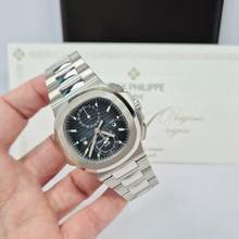  Patek Philippe Nautilus Travel Time Flyback Blue Dial 40.5mm Automático Completo 