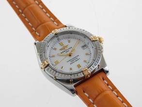 Thumbnail von Breitling Callisto Stahl Gold Medium 36mm mit original Perlmuttzifferblatt orangenes Lederband original Schließe