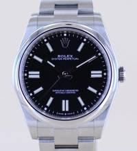  Rolex Oyster Perpetual 41 schwarz Dial Rehaut black 41mm 124300 B+P 