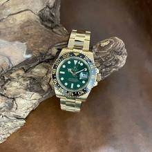  Rolex GMT-Master II GMT-Master II - FULLSET 2006 LC100 - Ref. 116718 FULLSET 2006 LC100 - Ref. 116718 - Grün 