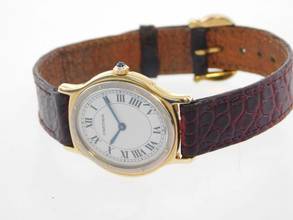 Thumbnail von Cartier Santos Dumont Arcade Paris Handaufzug 18 Karat Gelbgold mit Original Band und Schließe mit seltener 18 Karat Weißgoldlünette 24 x 31 mm Rarität