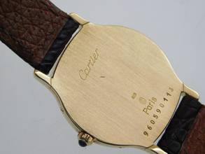 Thumbnail von Cartier Santos Dumont Arcade Paris Handaufzug 18 Karat Gelbgold mit Original Band und Schließe mit seltener 18 Karat Weißgoldlünette 24 x 31 mm Rarität
