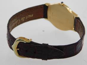 Thumbnail von Cartier Santos Dumont Arcade Paris Handaufzug 18 Karat Gelbgold mit Original Band und Schließe mit seltener 18 Karat Weißgoldlünette 24 x 31 mm Rarität