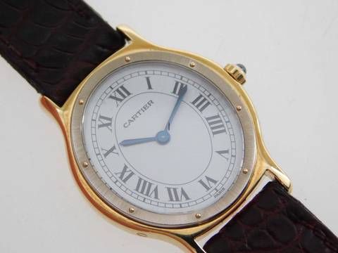  Cartier Santos Dumont Arcade Paris Handaufzug 18 Karat Gelbgold mit Original Band und Schließe mit seltener 18 Karat Weißgoldlünette 24 x 31 mm Rarität 