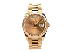  Rolex Day-Date 40 Gelbgold Ref. 228238 Champagner Diamant 