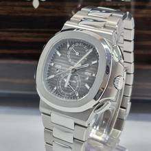 Thumbnail von Patek Philippe Nautilus Travel Time Flyback Chronograph 40.5mm Complete