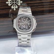 Thumbnail von Patek Philippe Nautilus Travel Time Flyback Chronograph 40.5mm Complete