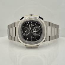 Thumbnail von Patek Philippe Nautilus Travel Time Flyback Chronograph 40.5mm Complete