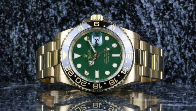  Rolex GMT-Master II Yellowgold Green 116718LN - with Box - D Serial 