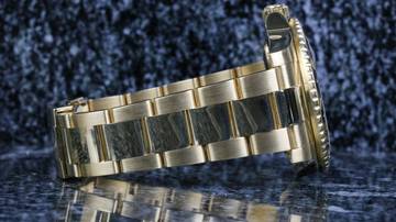 Thumbnail von Rolex GMT-Master II Yellow Gold Green 116718LN - with Box - D Serial