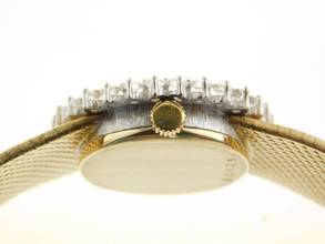 Thumbnail von Audemars Piguet 18-karat yellow gold with original diamond setting and green dial. Rarity Lady Cocktail watch in original condition, manual winding.