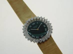 Thumbnail von Audemars Piguet 18-karat yellow gold with original diamond setting and green dial. Rarity Lady Cocktail watch in original condition, manual winding.