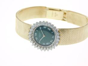 Thumbnail von Audemars Piguet 18-karat yellow gold with original diamond setting and green dial. Rarity Lady Cocktail watch in original condition, manual winding.