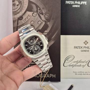  Patek Philippe Nautilus Travel Time Flyback Chronograph 40.5mm Completo 