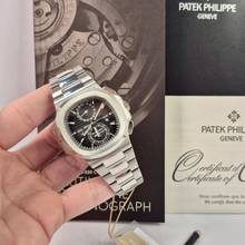 Patek Philippe Nautilus Travel Time Flyback Chronograph 40.5mm Complete