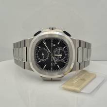 Thumbnail von Patek Philippe Nautilus Travel Time Flyback Chronograph 40.5mm Complete