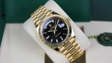 Thumbnail von Rolex Day-Date 40 Yellowgold Black Baguette 228238 - Fullset 2020