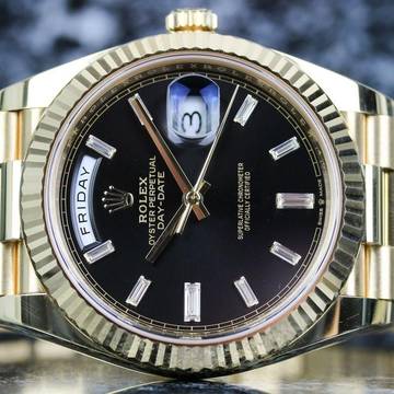 Rolex Day-Date 40 Yellowgold Black Baguette 228238 - Fullset 2020